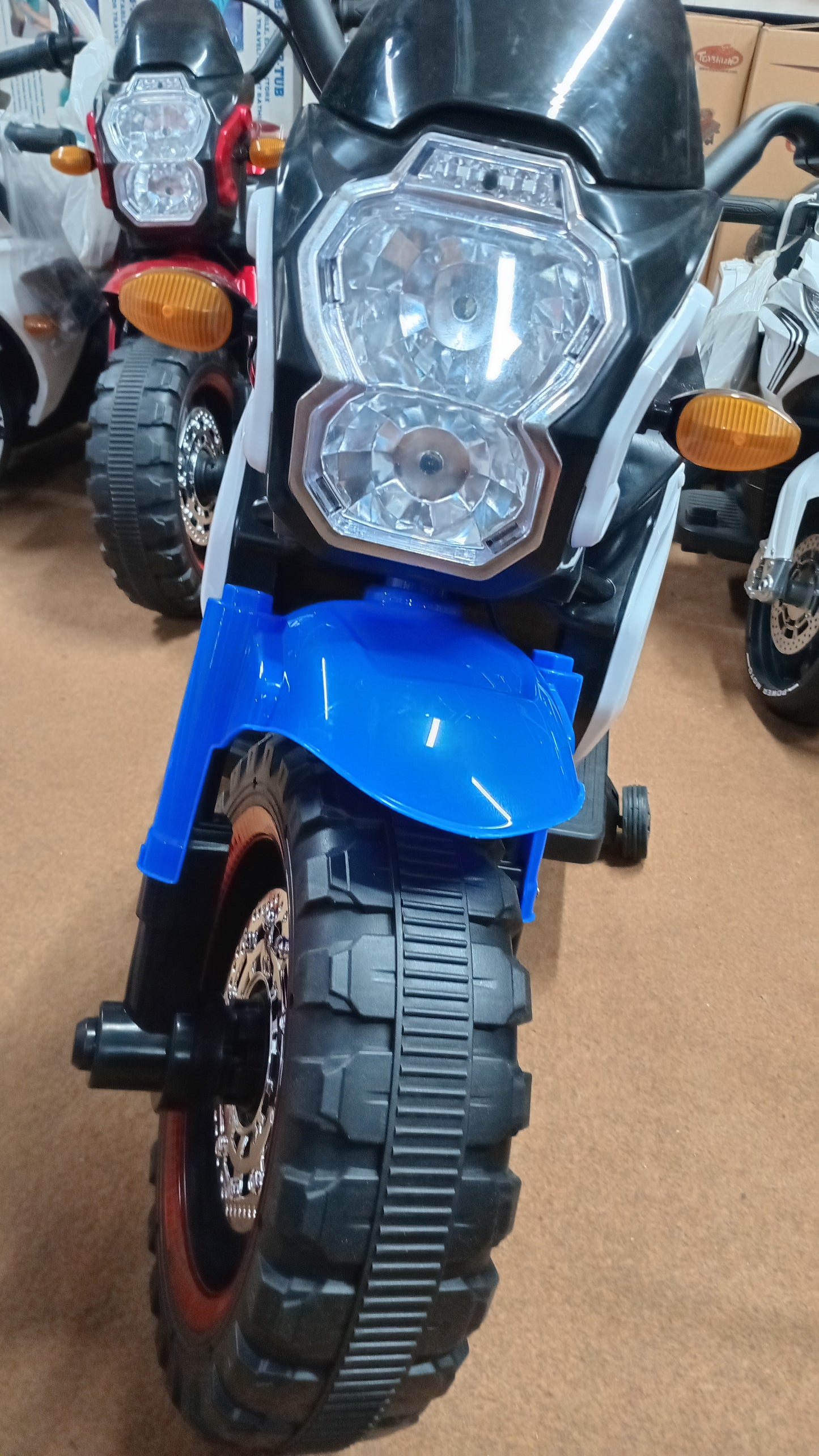 Trail bike for kids, For age 4 to 8 years, Rechargeable battery operated kids bike, music mp3 LED lights, motors big battery. Color blue White.